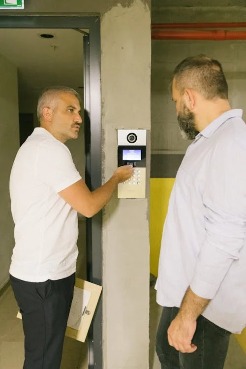 Access control keypad in a building corridor
