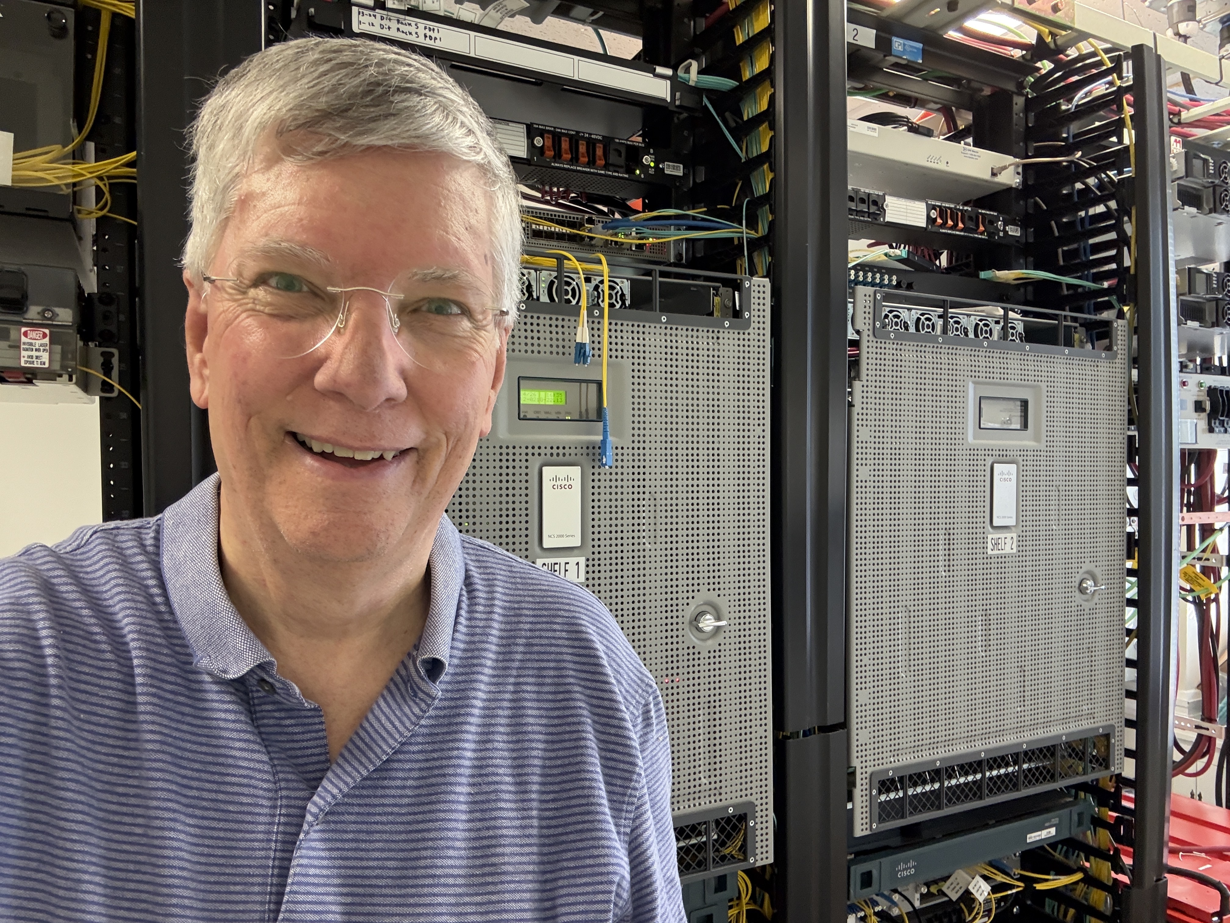 Nicky Smith in the downtown Greensboro data center with server racks